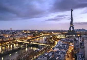 Photo Wallpaper Urban architecture of Paris - the French city by night with the Eiffel Tower Wallpaper Cropper