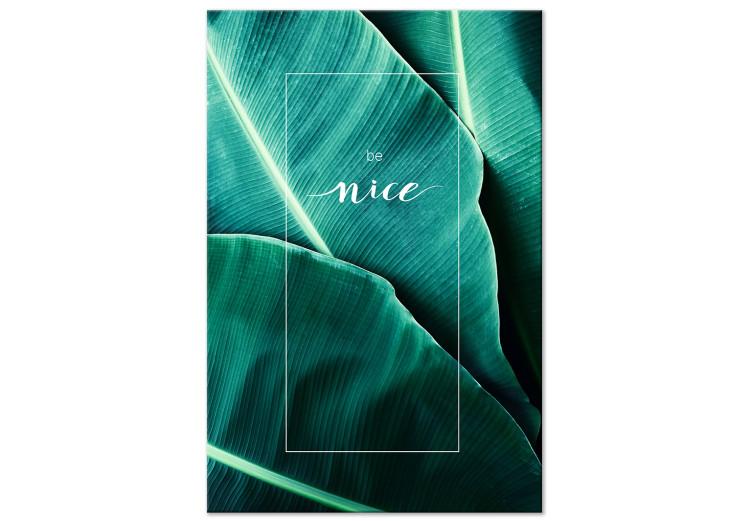 Canvas Be nice - a photograph of a leaf detail with a white inscription