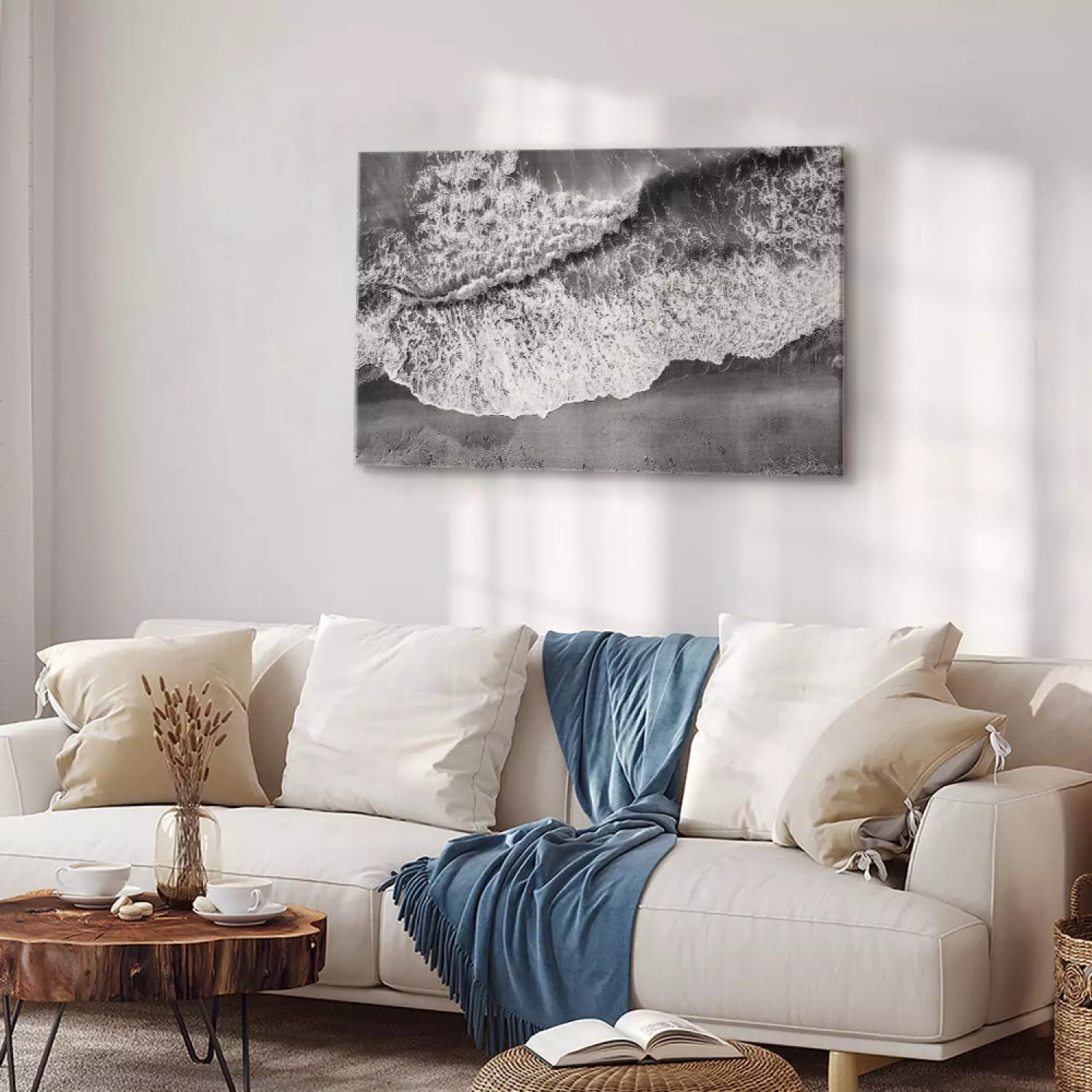 Canvas Print Ocean shore - black and white photograph of waves hitting the beach