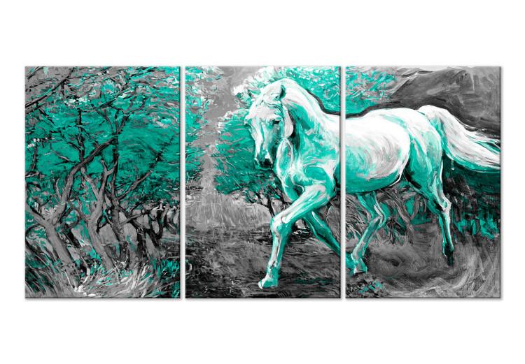 Canvas Galloping horse in turquoise light - animal silhouette with trees