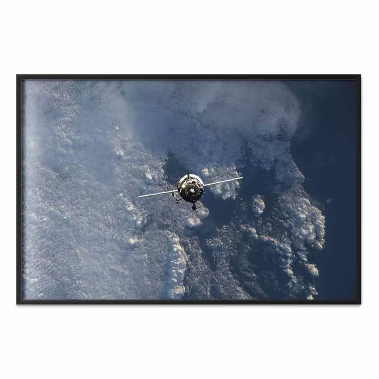 Blue Planet - space satellite above Earth against the backdrop of sky and clouds