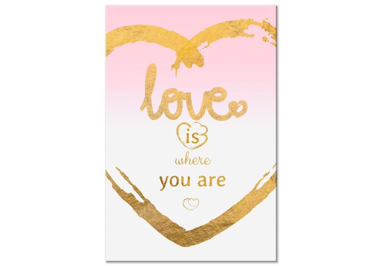 Canvas Love is where you are - English inscription inside a golden heart