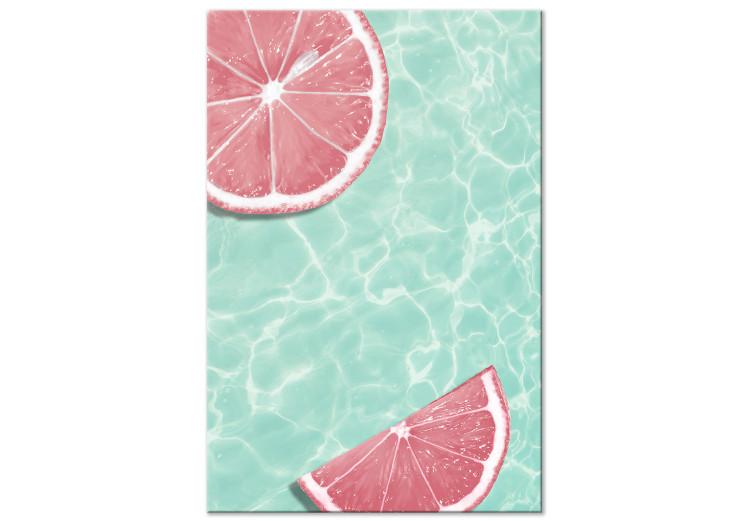 Canvas Grapefruit slices floating in turquoise water - summer abstraction