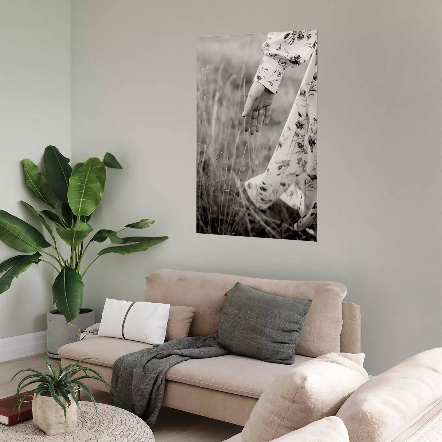 Poster In Touch with Nature - landscape of a woman's hand among plants in a meadow