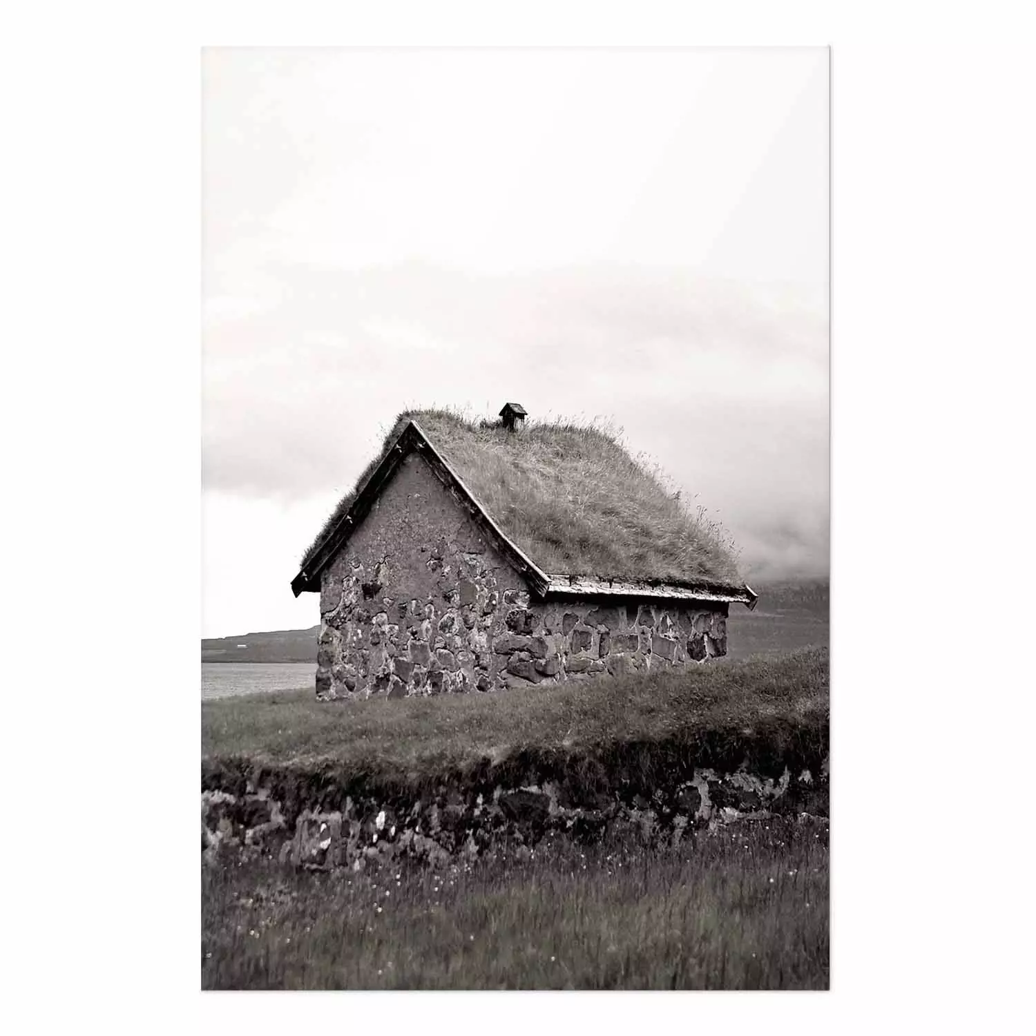 Wall Poster Fisherman's Hut - landscape of a field and a stone house against a clear sky
