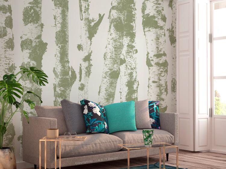 Wall Mural Birch trunks - forest landscape with green trunks on white background