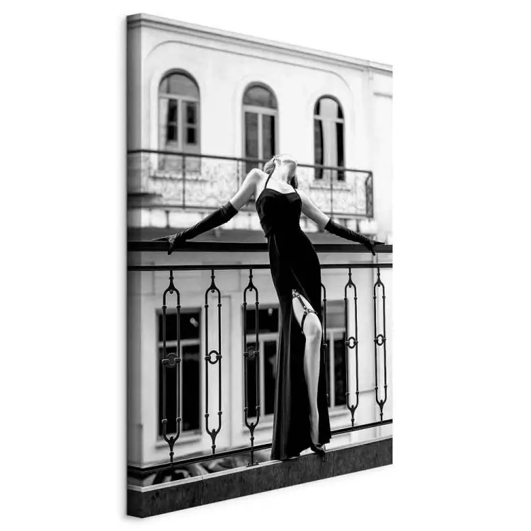 Dancing woman - black and white photo with figure on the balcony