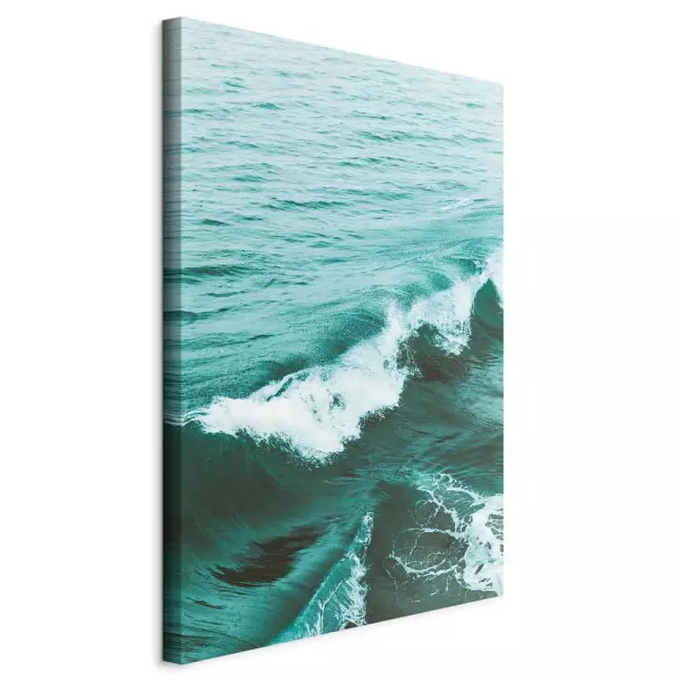 A peaceful wave - deep green sea with a small wave in the foreground