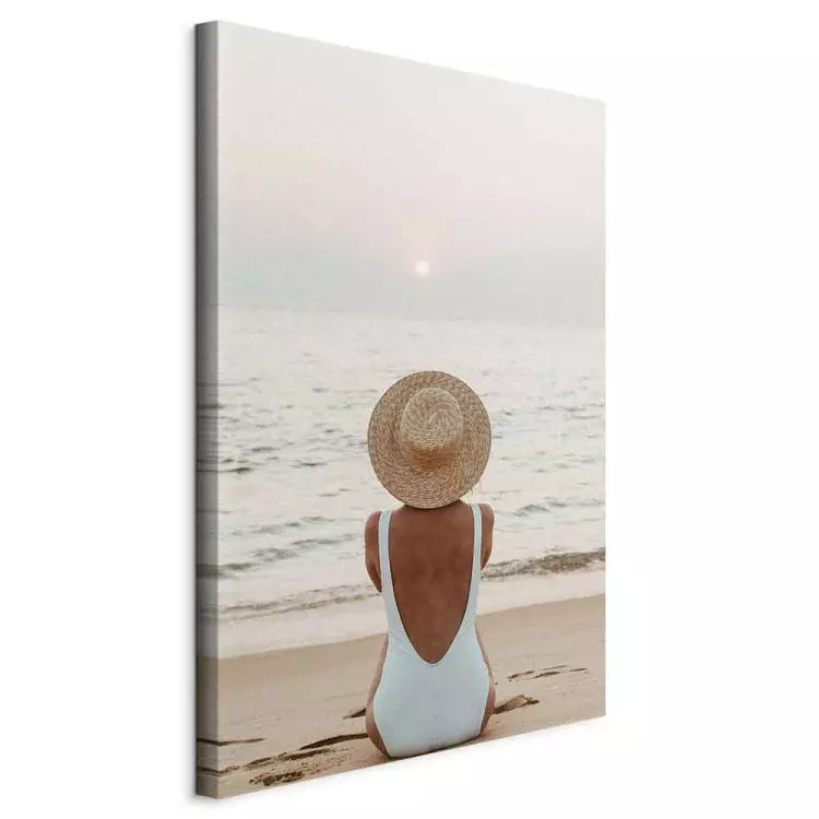 Woman in hat on the beach - Marine landscape with sunset