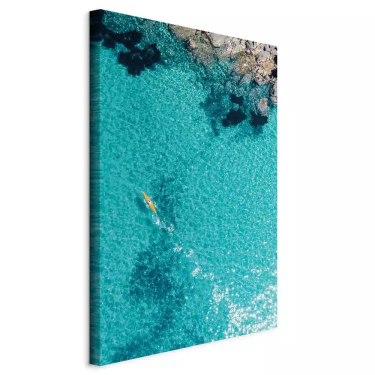 Azure water - sea landscape with transparent water and a yellow canoe