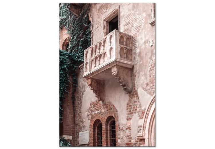 Canvas Balcony of a brick tenement - photo with an Italian city architecture