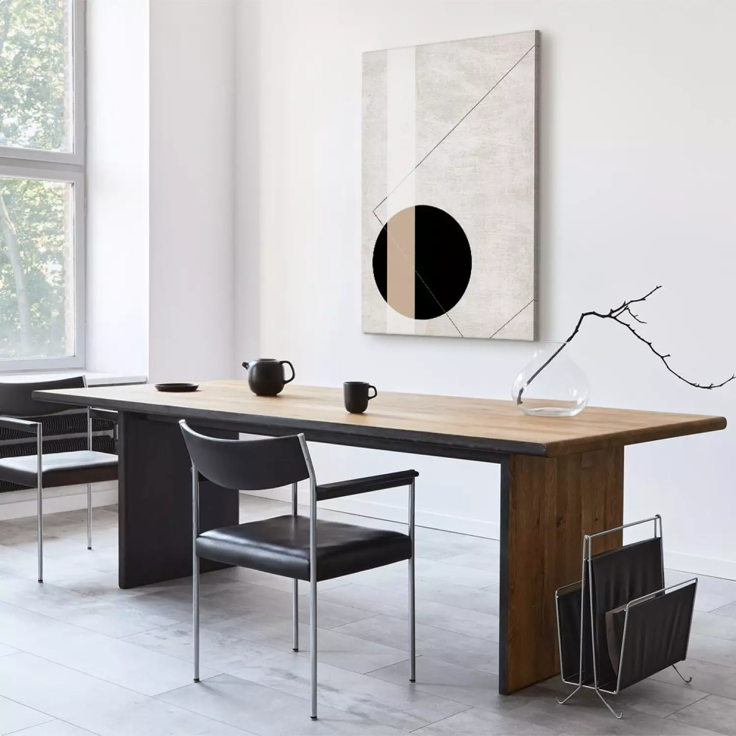 Canvas Print Black wheel - geometric abstraction on a beige background