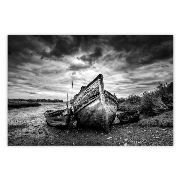 Poster Journey into Nature - black and white abandoned boat against sky and clouds