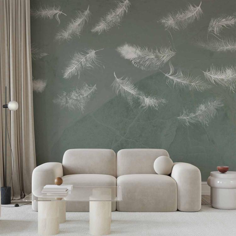 Wall Mural In flight - white feathers carried by the wind on an olive background with pattern