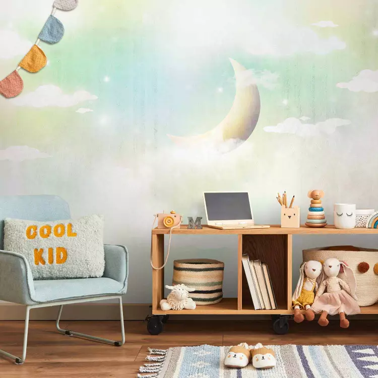 Children's landscape - clouds and moon in the sky in colourful shades