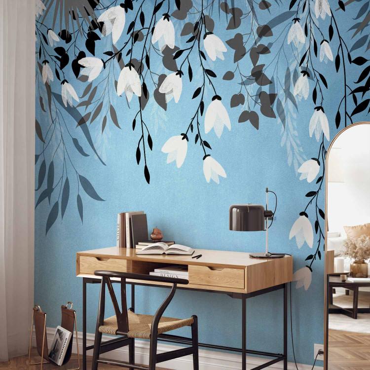 Wall Mural Blue energy - landscape with a loose composition of leaves and white flowers