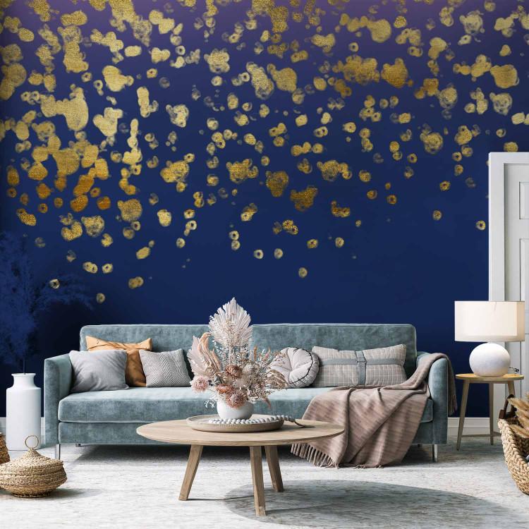 Wall Mural Golden drops - abstract with golden rain effect on blue background