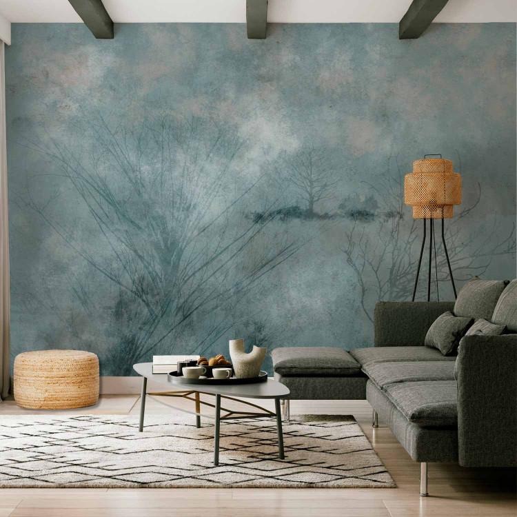 Wall Mural Winter abstraction - landscape with leafless trees in blue