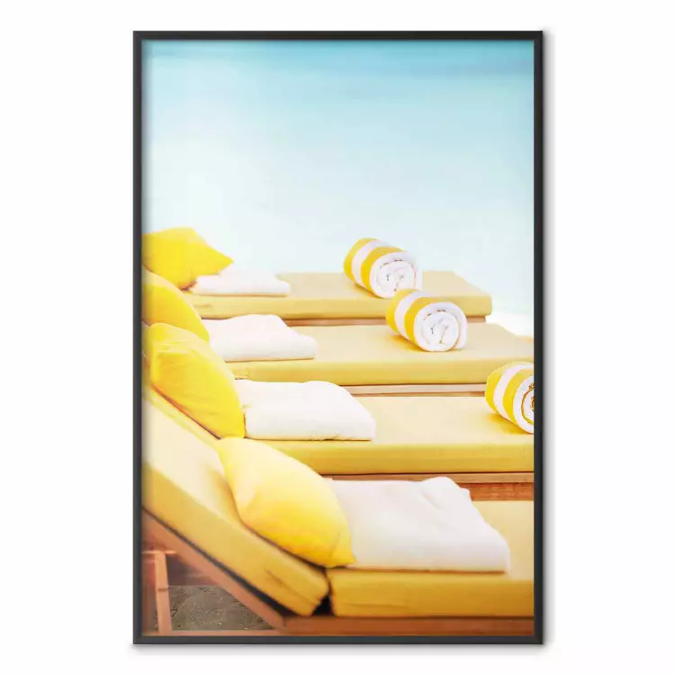 Summer at the Seaside - Yellow Sun Loungers on the Beach Lit by the Holiday Sun