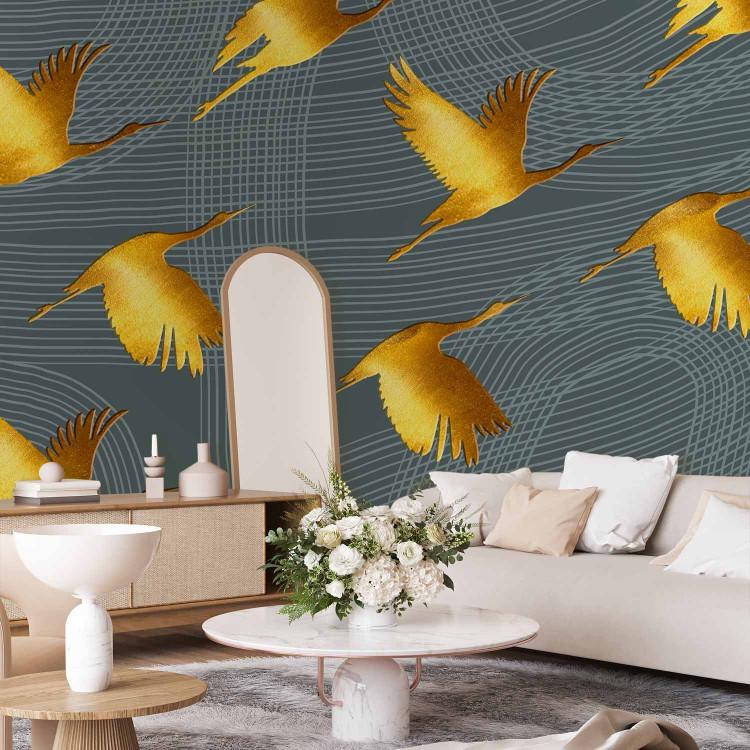 Wall Mural Flying golden cranes - abstract with flying birds on striped background