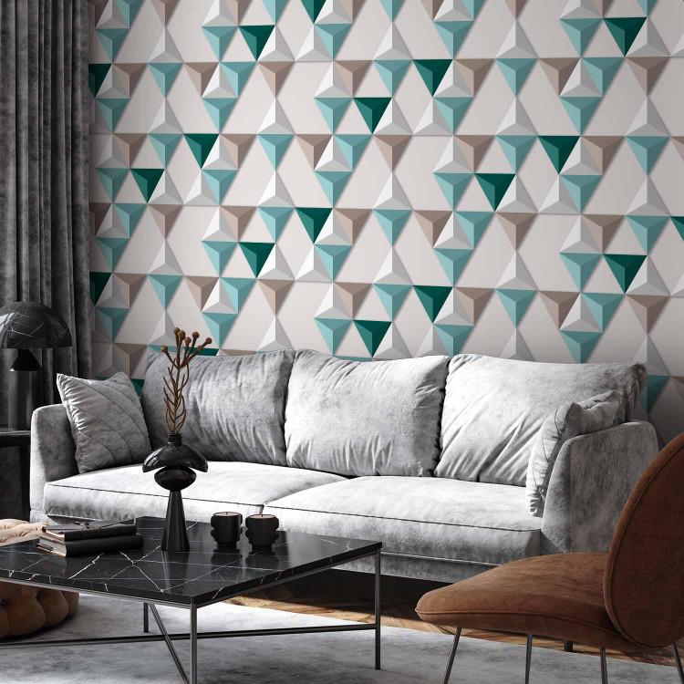 Wall Mural Geometric harmony - three-dimensional mosaic of triangles in turquoise