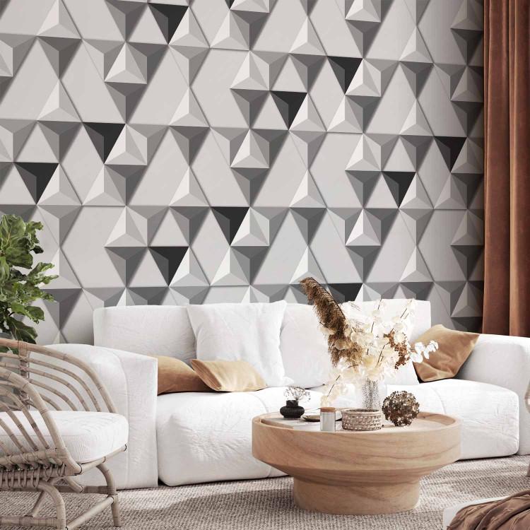 Wall Mural Geometric harmony - three-dimensional triangle mosaic pattern in grey
