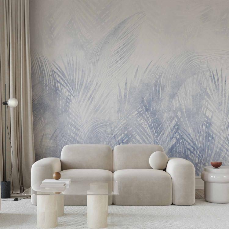Wall Mural Interpenetrating palm leaves - plant motif in a blue shade