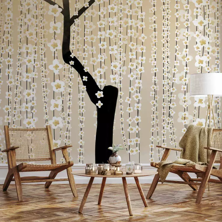 Tree with falling flowers - romantic bloom on a yellow background
