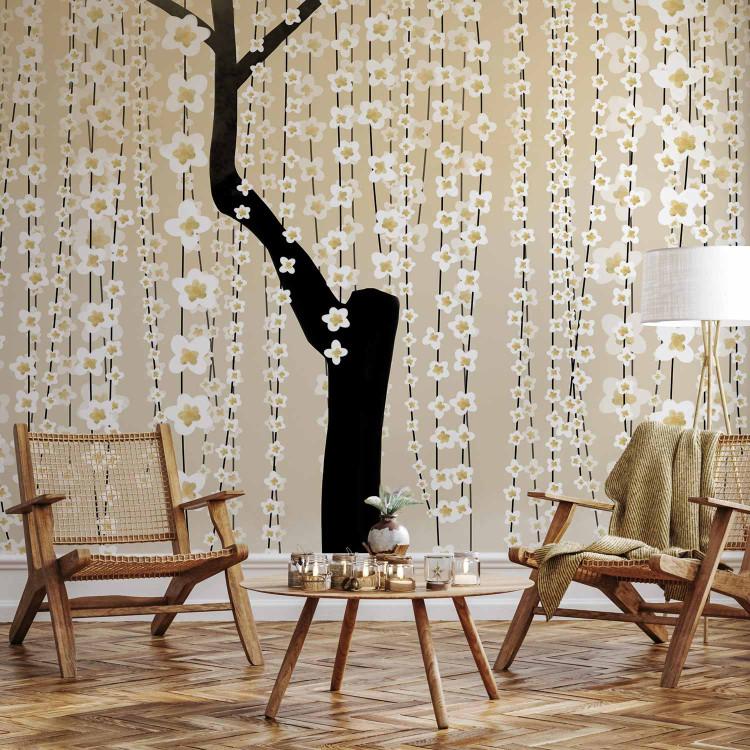 Wall Mural Tree with falling flowers - romantic bloom on a yellow background