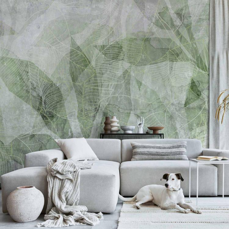 Wall Mural Abstract shadow - interlaced shapes and outline of leaves - green