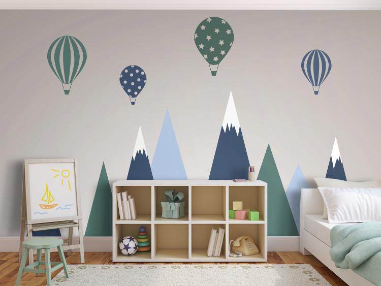 Wall Mural Children's landscape - graphic with balloons over blue-green mountains