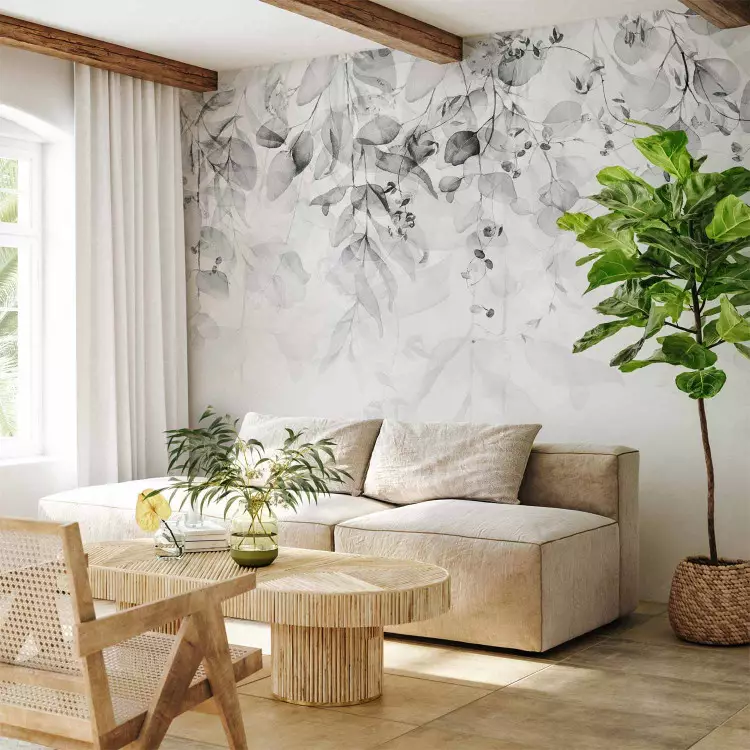 Wall Mural Cascade of Gray - Delicate Twigs Full of Leaves on a Light Background