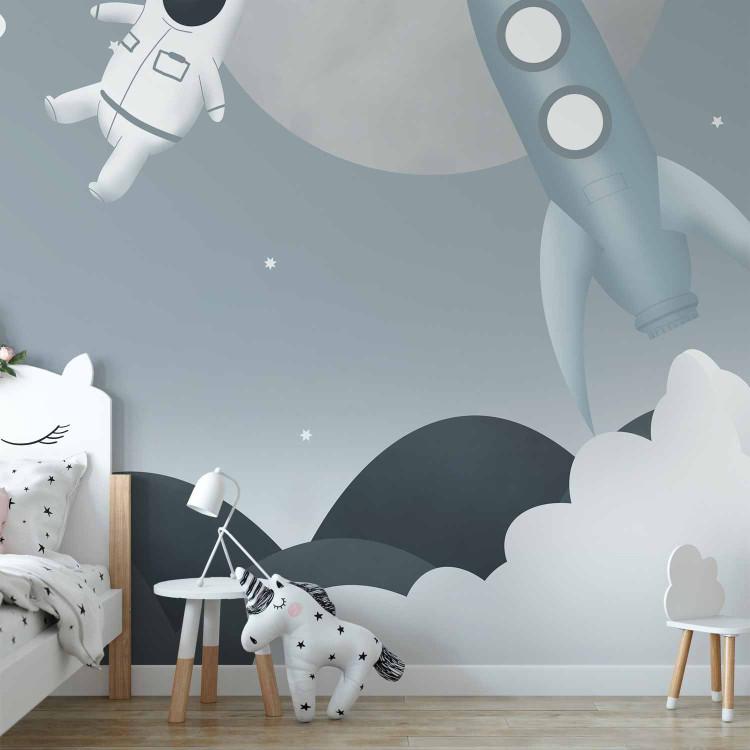 Wall Mural Astronaut in Space - Rocket and Planets in the Gray-Blue Sky