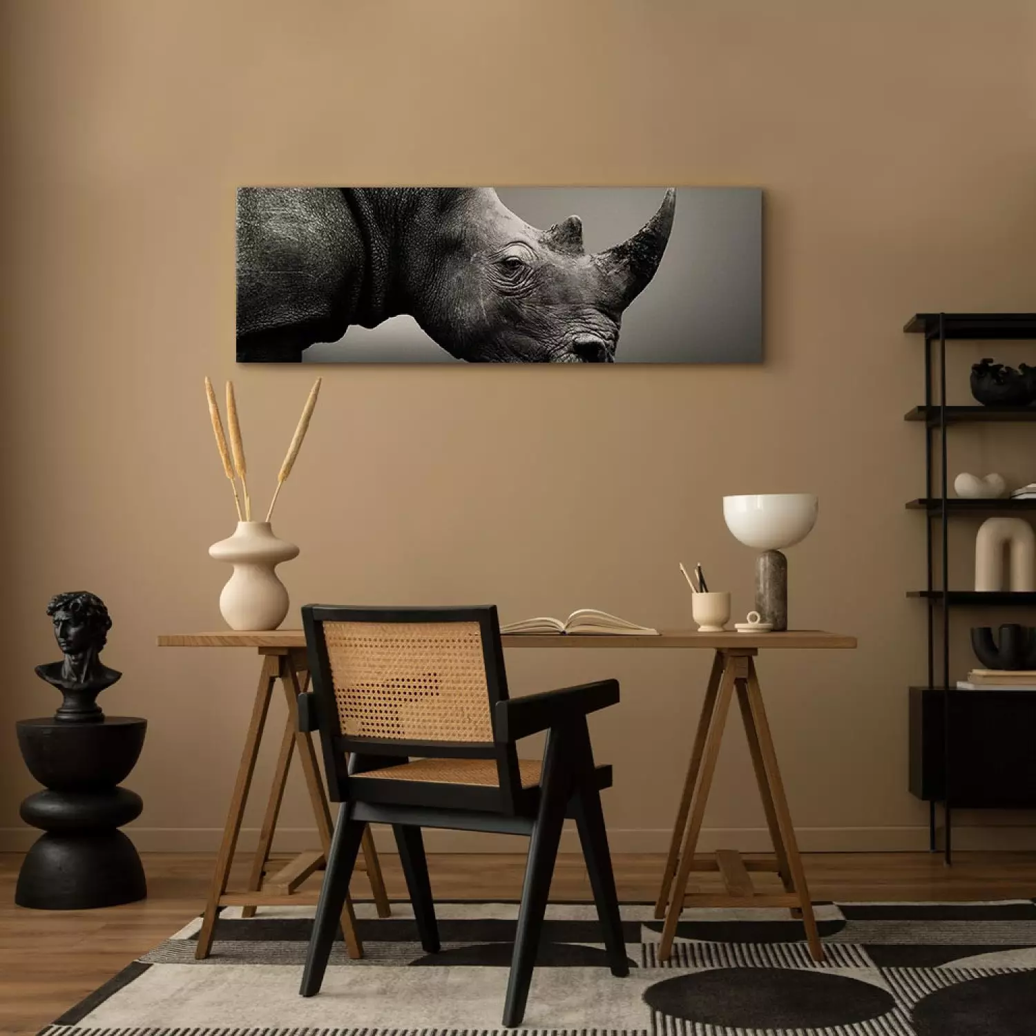 Canvas Art Print A stately rhinoceros - a black and white animal on a plain background