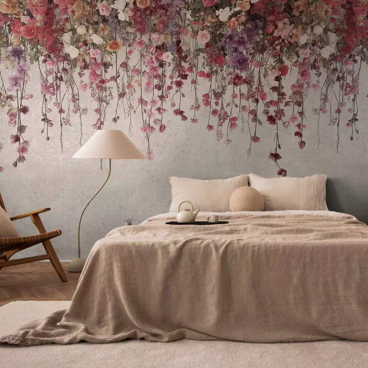 Hanging flowers - a delicate composition of roses and plants on a light background