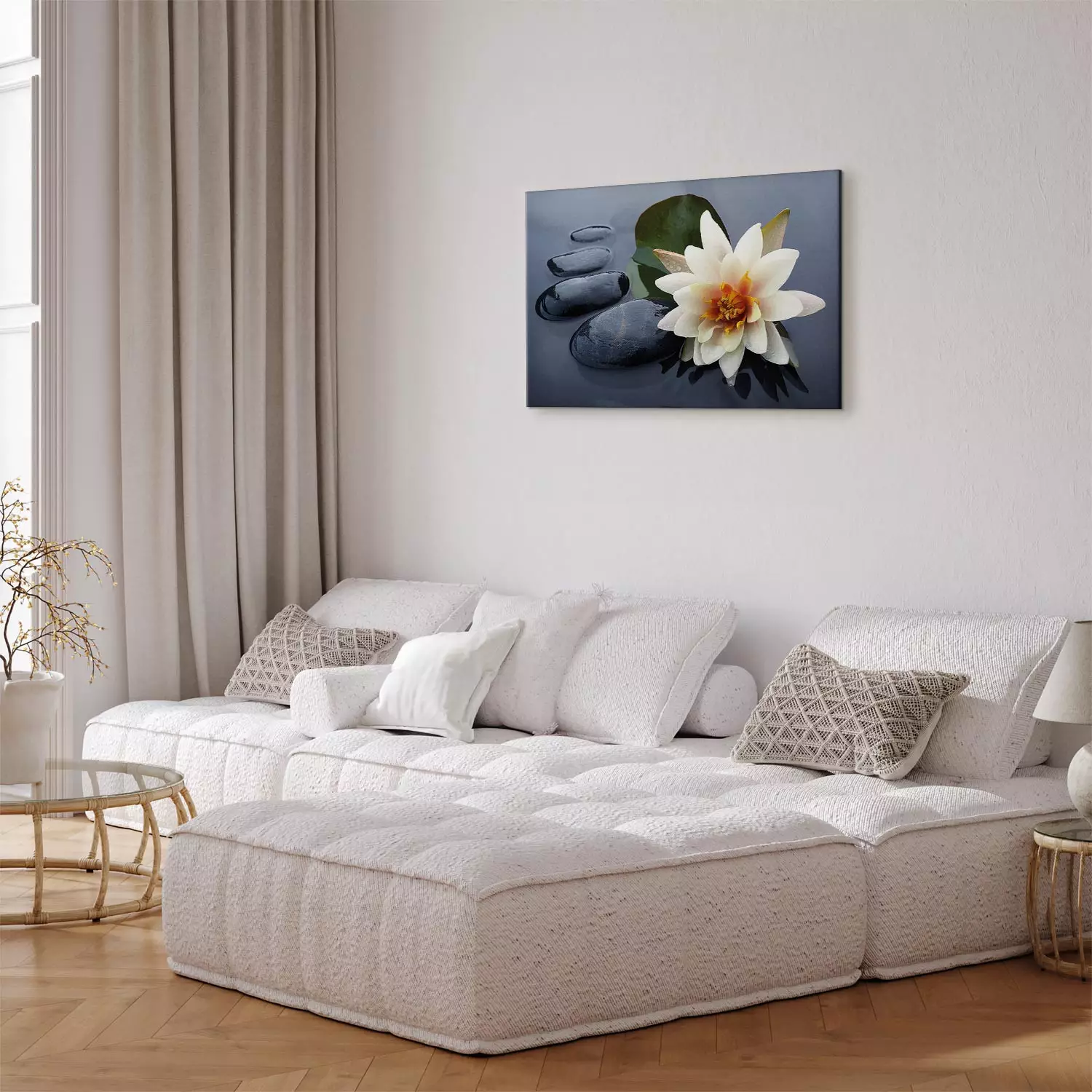 Canvas Art Print Flower on the surface - white water lily and stones on a gray background