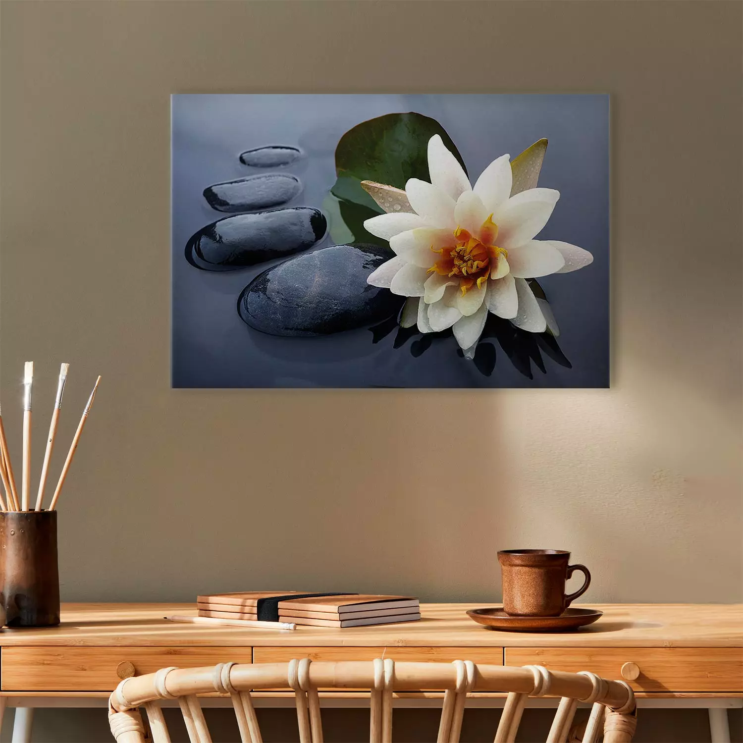 Canvas Art Print Flower on the surface - white water lily and stones on a gray background