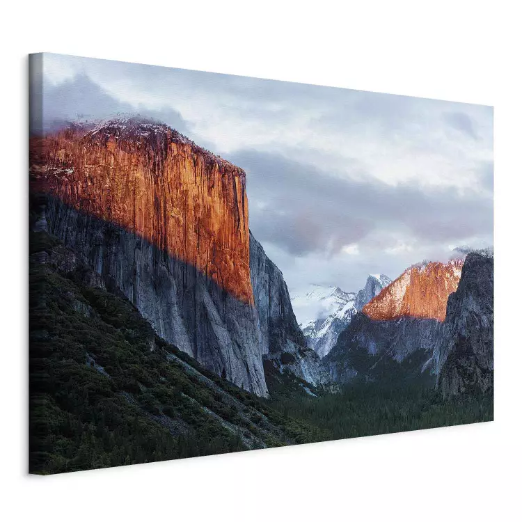 Mountain valley - landscape with illuminated peaks