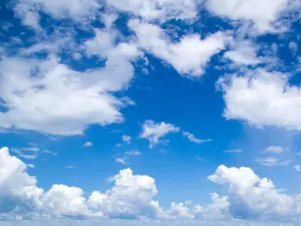 Wall Mural Under the Open Sky - Landscape Depicting Blue Sky with Clouds Wallpaper Cropper