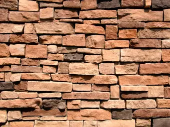 Wall Mural Uneven Brick - Background with Uneven Brick Wall Design in 3D Effect Wallpaper Cropper