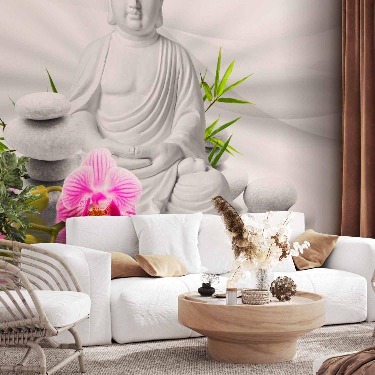 Wall Mural Buddhism - Meditating Buddha on a water surface with orchids on a white background