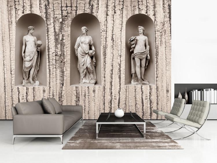 Wall Mural Ancient Greece - three statue figures on a background of white cracked wood