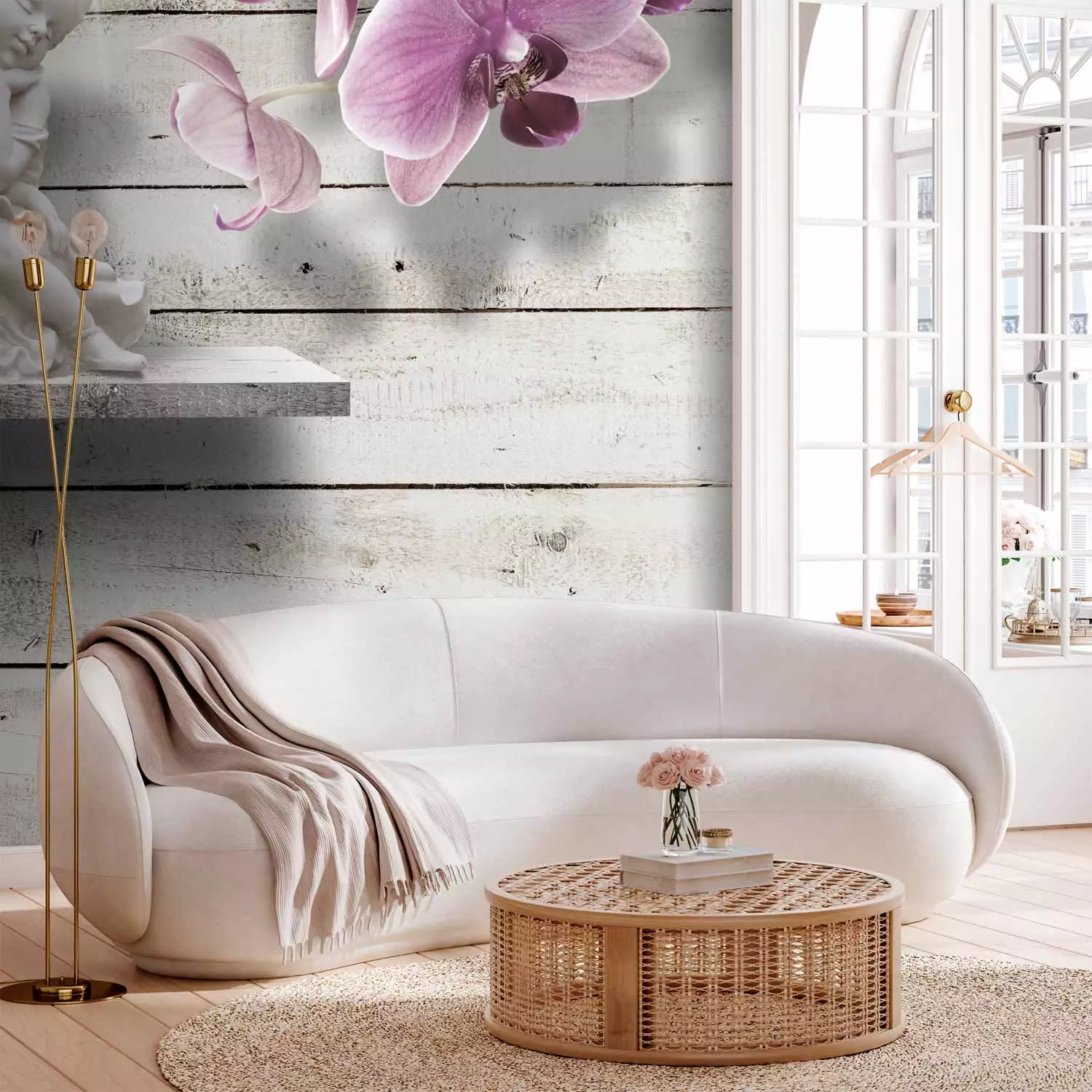 Wall Mural Cupid's Kiss - statue of angelic couple on a backdrop of gray wood with an orchid