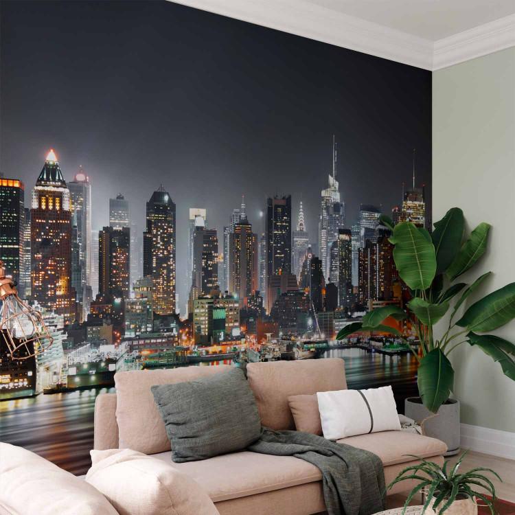 Wall Mural Panorama of New York - architecture of the city at night with skyscrapers and the bay