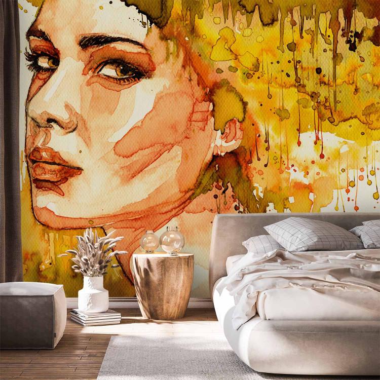 Wall Mural Amber portrait of a woman - silhouette and face of a woman in yellow watercolour