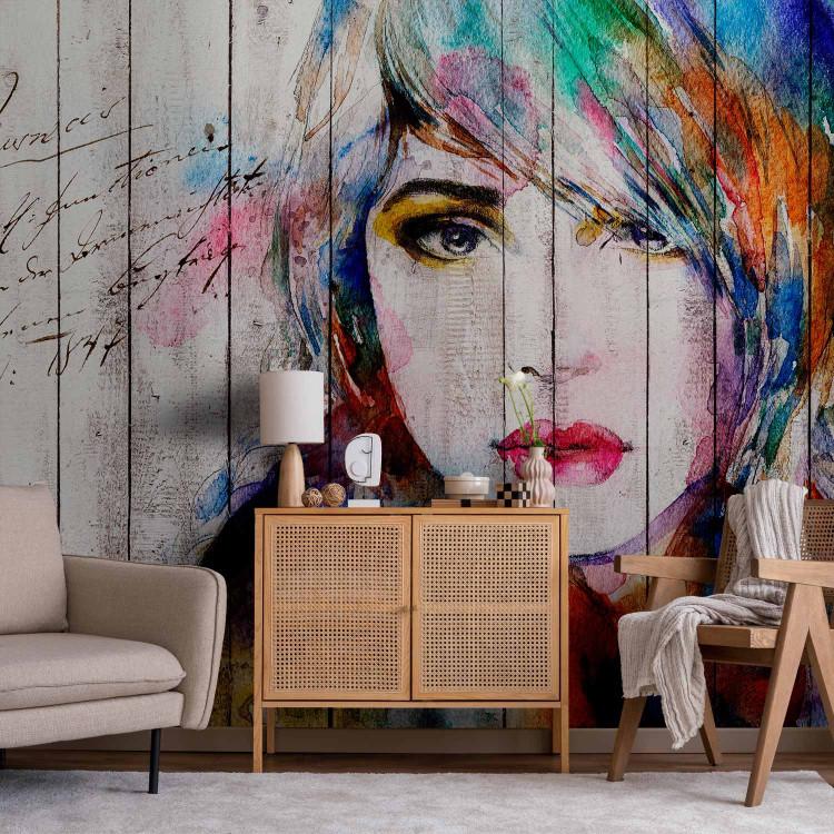 Wall Mural Portrait of a woman's face - coloured watercolour on white wood and text
