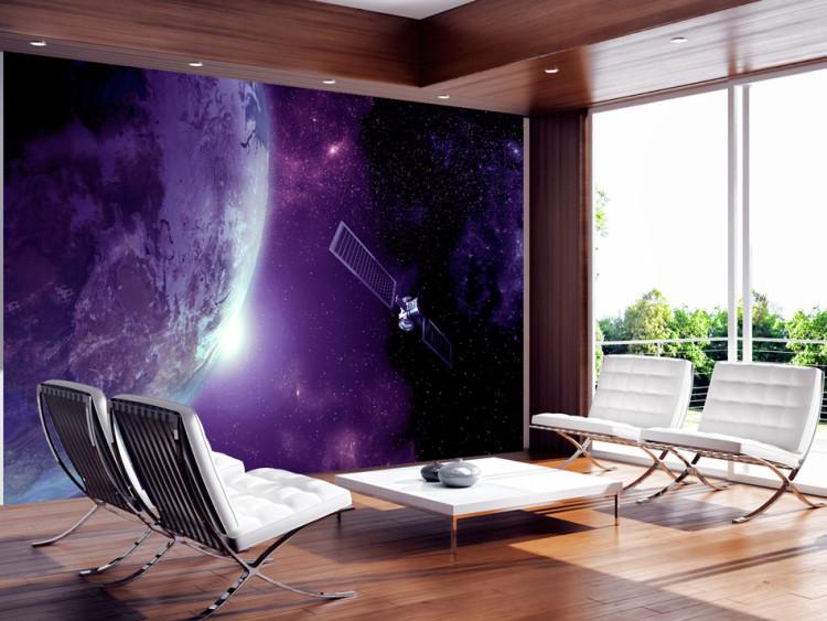 Wall Mural Purple Universe - cosmic landscape with stars, Earth, and a satellite