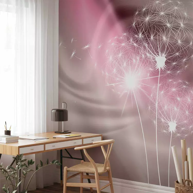 Flying dandelions - white flowers on romantic luminous background