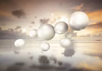 Wall Mural Abstraction with sunrise - white pearls floating above sea water Wallpaper Cropper