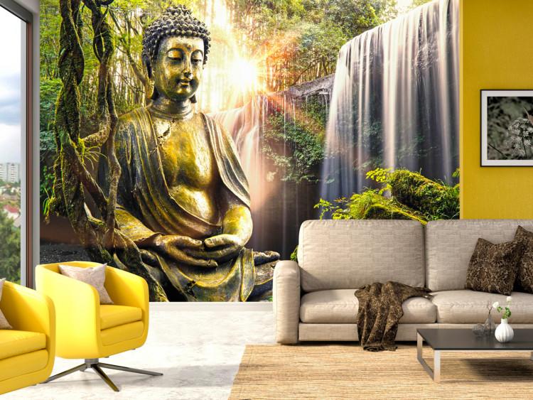 Wall Mural Harmony guard - Buddha figurine surrounded by beauty of nature, waterfall and exotic Asian vegetation